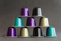 Beautiful colored coffee capsules on black background Royalty Free Stock Photo