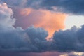 Beautiful colored dramatic stormy cumulus clouds on sky at sunset. Close-up view Royalty Free Stock Photo