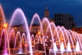 Beautiful colored fountain in the city Dnepr at night .