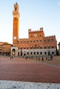 Beautiful colored and medieval street in the old town of Siena, Italy