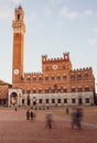 Beautiful colored and medieval street in the old town of Siena, Italy