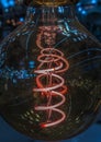Beautiful colored spiral in an electric lamp. Royalty Free Stock Photo