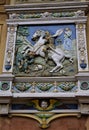 A beautiful colored terracotta sculpture, depicting Saint George slaying the dragon, adorns a wall of the villa museum of Frederic