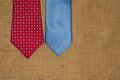 Beautiful colored ties on the old sacking Royalty Free Stock Photo