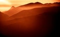 A beautiful, colorful, abstract mountain landscape in a red tonality. Royalty Free Stock Photo