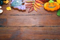 Beautiful colorful background for Halloween with gingerbread, autumn foliage,