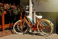 beautiful colorful bicycles parked at old sunny european street, summer concept Royalty Free Stock Photo