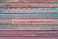 Beautiful colorful blue, pink and orange old wooden texture background. Scratched weathered wooden wall Royalty Free Stock Photo