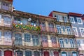 Beautiful colorful building facede in Porto Portugal with azulejo tiles with sao joao holiday decoration