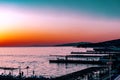 Beautiful, colorful and contrasting sunset over the sea, ocean. The hot sun illuminates the spacious landscape, casting the glare Royalty Free Stock Photo