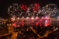 Beautiful colorful firework over the city at night Royalty Free Stock Photo