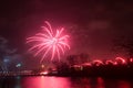 Beautiful, colorful fireworks above the river during an Independence day Royalty Free Stock Photo