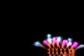 Beautiful colorful fireworks display on the urban lake for celebration on dark night background. colorful fireworks at night