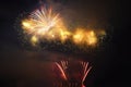 Beautiful colorful fireworks on the water surface with a clean black background. Fun festival and international contest of Firefig Royalty Free Stock Photo