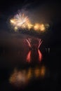 Beautiful colorful fireworks on the water surface with a clean black background. Fun festival and international contest of Firefig Royalty Free Stock Photo