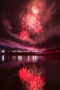 Beautiful colorful holiday fireworks on the black sky background, long exposure