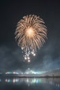 Beautiful colorful holiday fireworks on the black sky background, long exposure Royalty Free Stock Photo