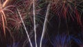 Beautiful colorful holiday fireworks on the black sky background, long exposure. Festive concept Royalty Free Stock Photo