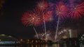 Beautiful colorful holiday fireworks on the black sky background, long exposure. Festive concept Royalty Free Stock Photo