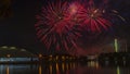 Beautiful colorful holiday fireworks on the black sky background, long exposure. Festive concept Royalty Free Stock Photo