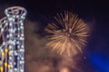 Beautiful colorful holiday fireworks in the evening sky with majestic clouds Royalty Free Stock Photo