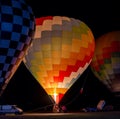 Beautiful and colorful hot air balloon ready for take-off at night Royalty Free Stock Photo