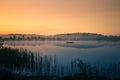A beautiful, colorful landscape of a misty swamp during the sunrise. Atmospheric, tranquil wetland scenery with sun Royalty Free Stock Photo