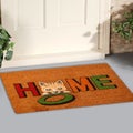Beautiful Colorful Little Hello Kitty Welcome zute doormat with HELLO outside home with yellow flowers and leaves Royalty Free Stock Photo