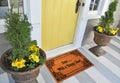 Beautiful Colorful Motif design Welcome zute doormat with `EnterÃÂ¢Ã¢âÂ¬ÃÂ¦ with a happy heart` Text outside home Royalty Free Stock Photo