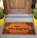 Beautiful Colorful Motif design Welcome zute doormat with `EnterÃÆÃÂ¢ÃÂ¢Ã¢â¬Å¡ÃÂ¬ÃâÃÂ¦ with a happy heart` Text outside home Royalty Free Stock Photo