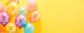 Beautiful colorful pastel balloons with on yellow background for party, birthday, celebration banner. Luxury festive Royalty Free Stock Photo
