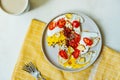 Beautiful colorful simple homemade breakfast of fried eggs with egg yolk, cheese, tomatoes, paprika and coffee. vegan breakfast