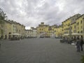 Beautiful colorful square - Piazza dell Anfiteatro in Lucca. Tuscany, Italy