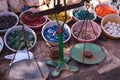 Beautiful colorful stones in clay vessels with Indian tarazu to measure the weight Royalty Free Stock Photo