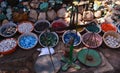 Beautiful colorful stones in clay vessels with Indian tarazu to measure the weight Royalty Free Stock Photo