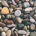 Beautiful colorful stones by the sea on the beach. Royalty Free Stock Photo