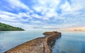 Beautiful colorful sunrise at the calmness sea shore with cloudy