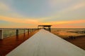 Beautiful Colorful Sunset with the bridge at the sea beach background in Thailand. Landscape nature concept. silhouette people Royalty Free Stock Photo