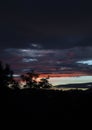 Beautiful Colorful sunset in the city with cloudy sky and mountains Royalty Free Stock Photo