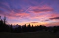 A beautiful colorful sunset, clouds changing colors from yellow to red, pastel colours of the sky Royalty Free Stock Photo