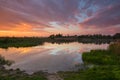 Beautiful colorful sunset at countriside lake Royalty Free Stock Photo