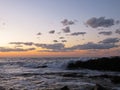 Beautiful Colorful Sunset Dawn Over Sea Waves Hitting Rocky Stone Beach Royalty Free Stock Photo