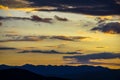 Colorful sunset above hill tops