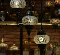 Traditional bright decorative hanging Turkish lamps and colourful lights with vivid colours  in the Istanbul Bazaar, Turkey Royalty Free Stock Photo