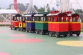 a beautiful colorful train at the Jatinangor National Flower Park tourist attraction in the afternoon