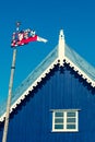 Beautiful colorful weathercock waving in the Curonian Spit in Nida fishermen`s village, Lithuania