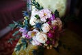 Beautiful colorful wedding bouquet of flowers for the bride girl