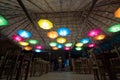 Beautiful colorfull umbrellas lamps into a Colombian Guajira hostel restaurant