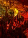 Illuminated dripstones in cave