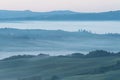 Beautiful colors of green spring panorama landscape of Tuscany. Most popular place in Italy. Green fields and blue sky and Cypress Royalty Free Stock Photo